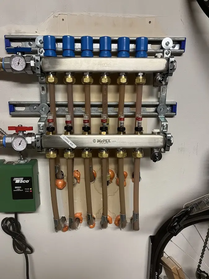 Plumber performing Leak Detection at a residential property in Hingham